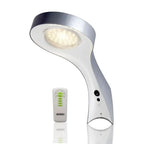 White curved solar wall light with LED bulb shown alongside its remote control with green indicator buttons.