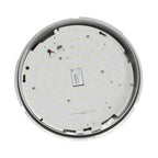 Overhead view of LED bulkhead light showing white circular PCB with yellow LED chips, gray trim ring, and central Philips dri