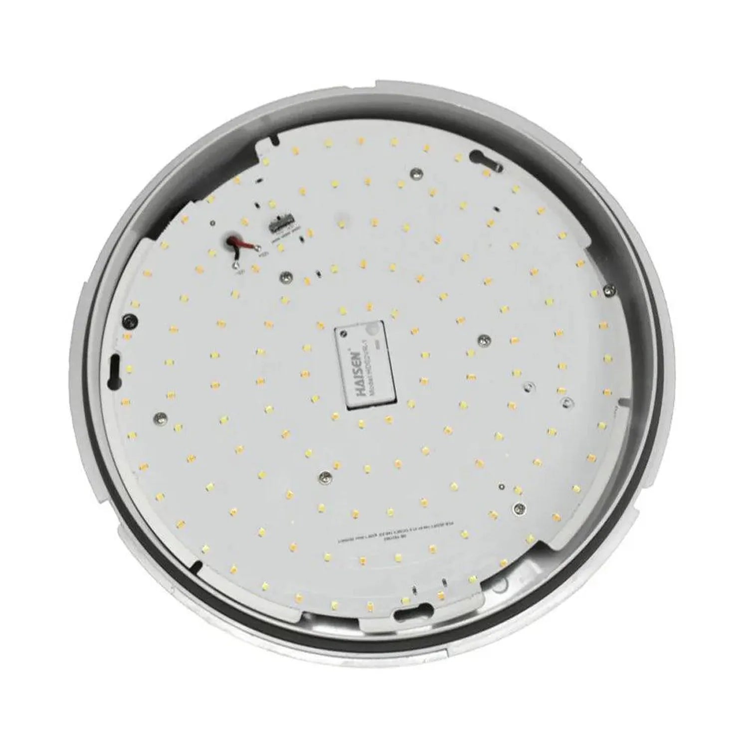 Overhead view of LED bulkhead light showing white circular PCB with yellow LED chips, gray trim ring, and central Philips dri