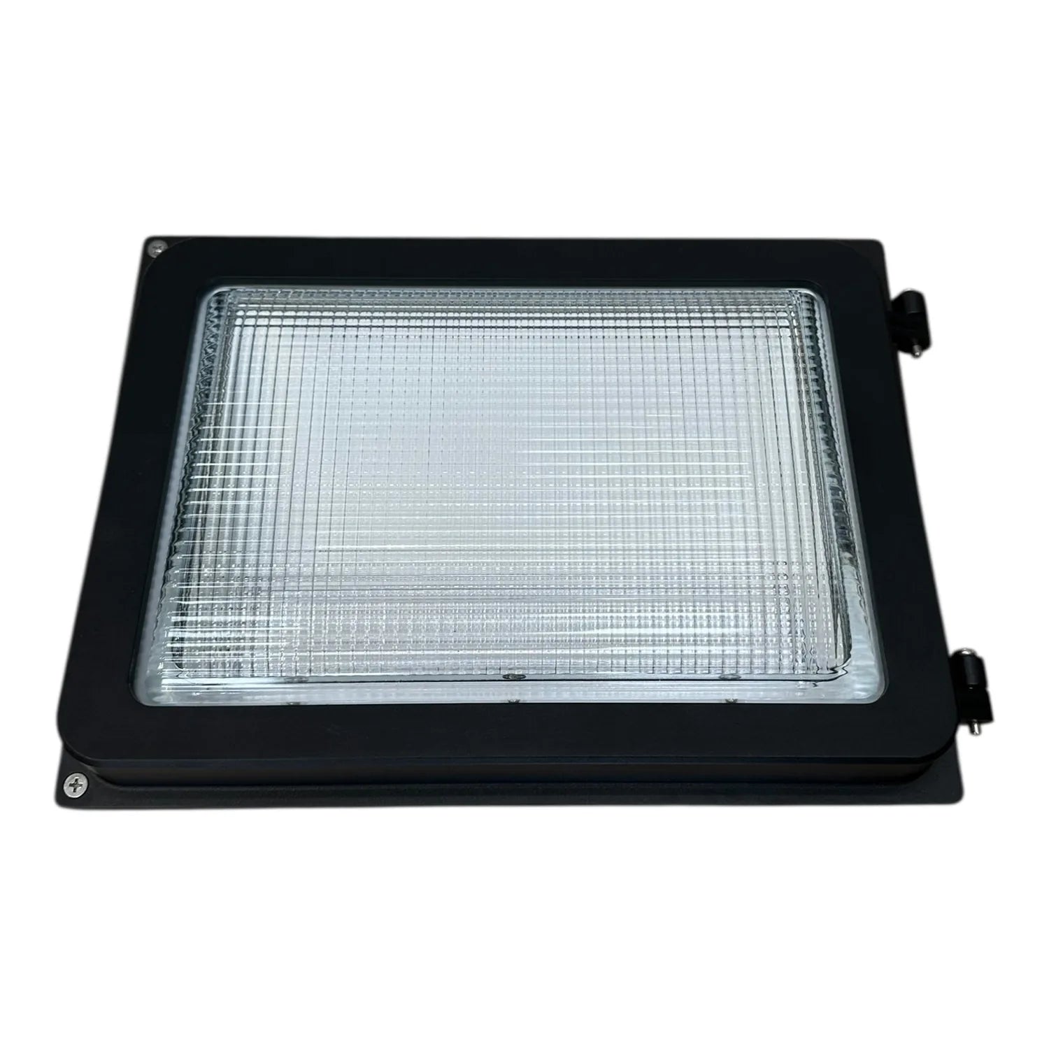 Black rectangular LED wall pack light with clear prismatic lens and mounting hardware visible.