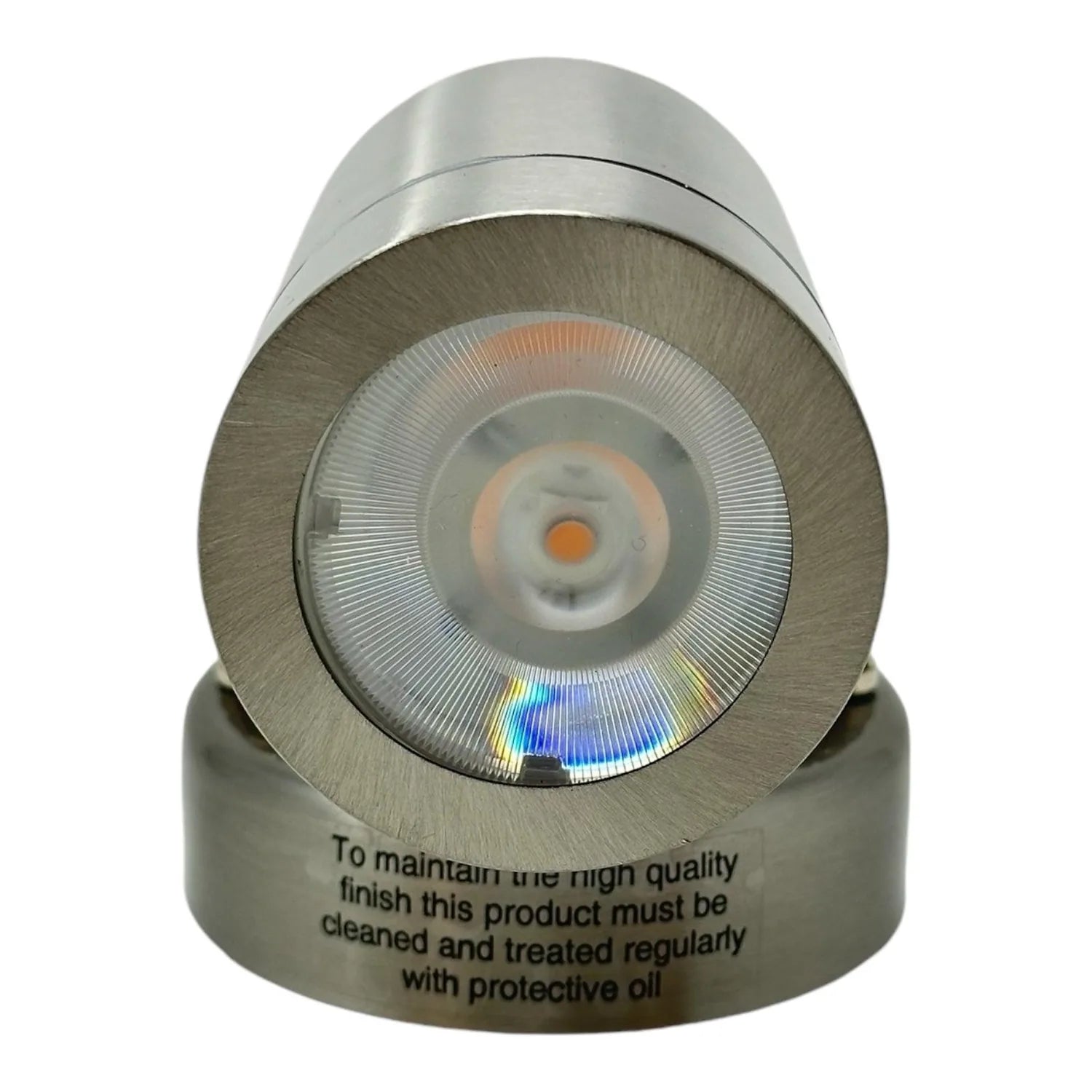 Stainless steel LED outdoor downlight with concentric circular lens showing warm and cool color tones, maintenance text visib