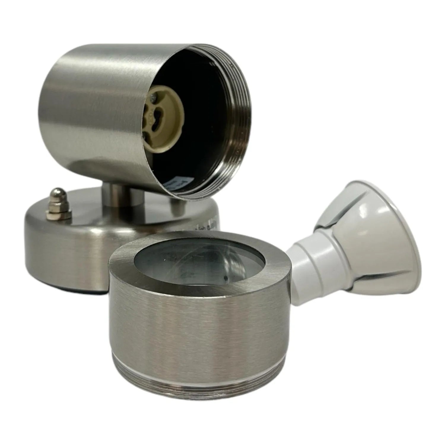 Stainless steel LED outdoor spotlight with adjustable head and cylindrical base, shown disassembled to display internal ceram