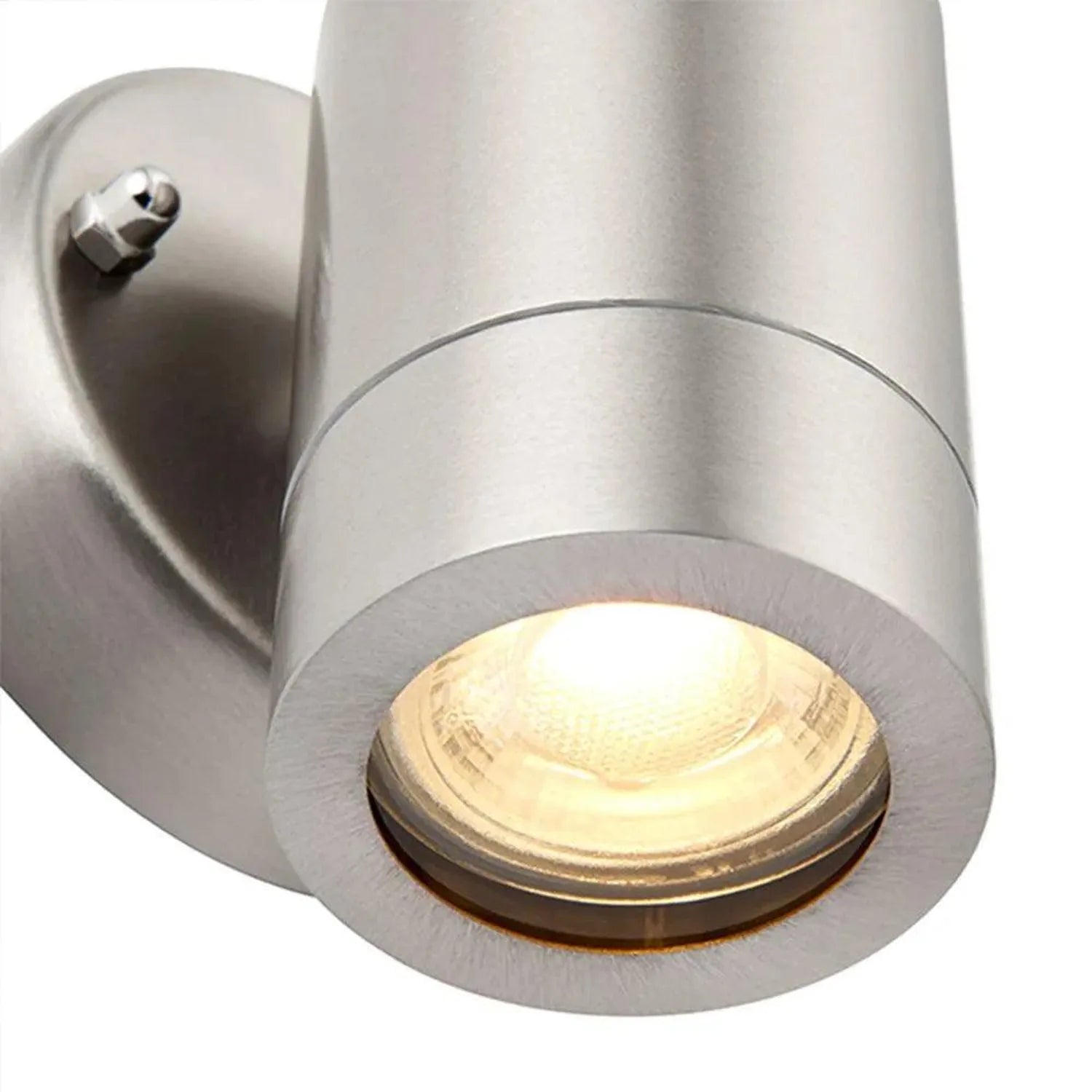 Silver cylindrical LED outdoor wall light with warm glow, shown against white background.