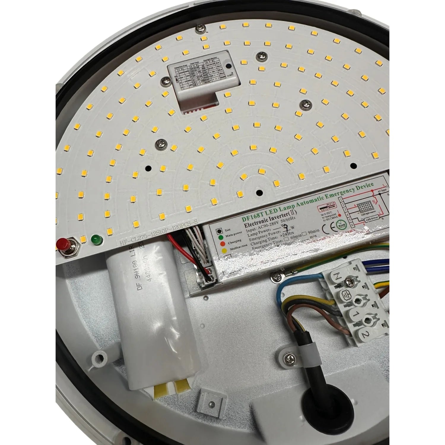 Interior view of 15W LED ceiling light showing yellow LED array, electronic inverter device, battery backup component, and wi