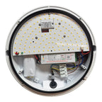 Interior view of round LED ceiling light showing yellow LED chips, electronic inverter, battery backup, and wiring components