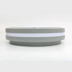 Circular gray and white LED wall light shown from the side against a white background.