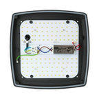 Interior view of LED wall light showing circuit board with SMD LEDs, driver module labeled HLB-20W-HI, and color-coded wiring