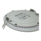 Voltacon LED round panel light viewed from back, showing white casing, mounting springs, wiring terminals, and certification 