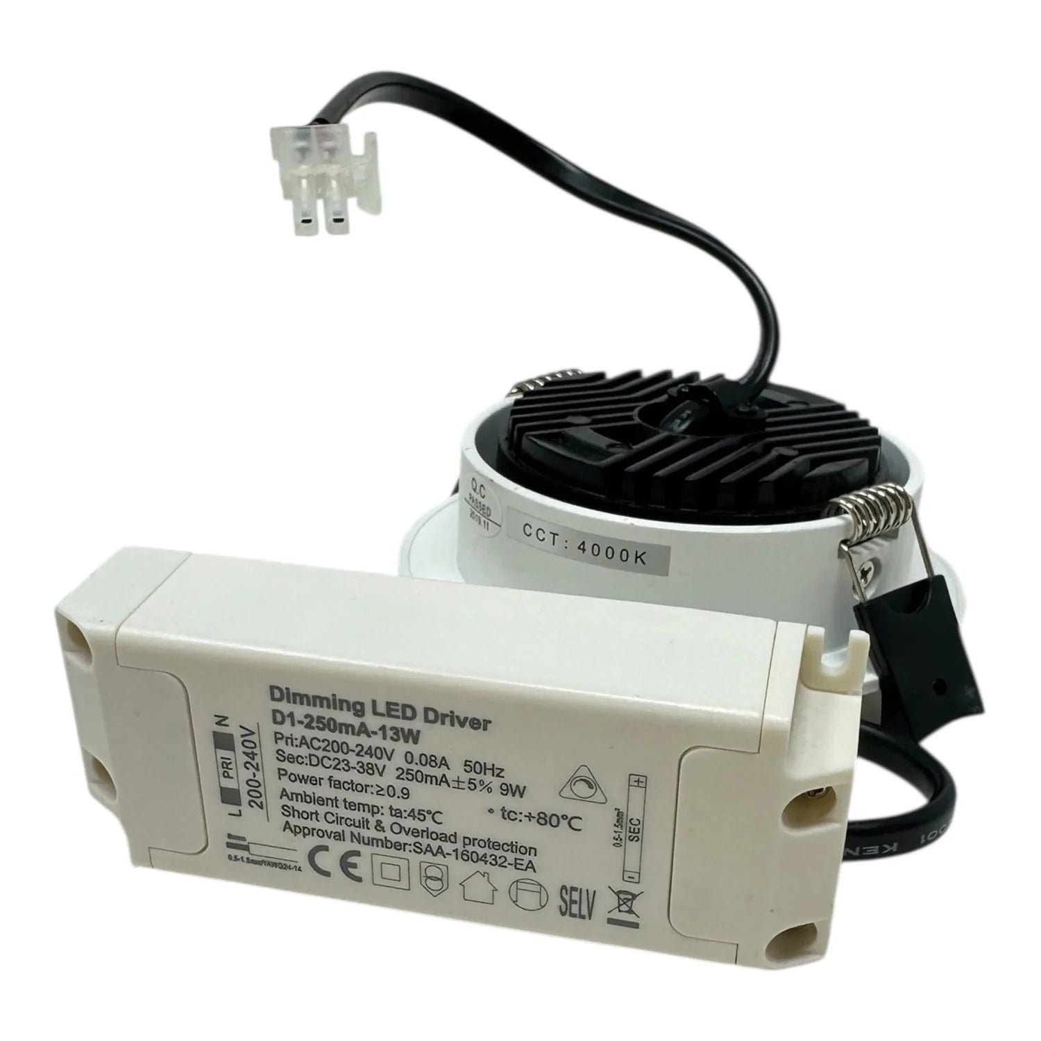 Dimming LED driver with white housing, black heat sink, and connector cable against white background.