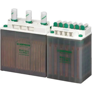 Hoppecke OPzS solar batteries with white caps and green accents, shown as two connected units with dark electrolyte-filled ch
