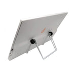 White portable monitor displayed from rear angle with stand extended, showing logo and ports on back panel.