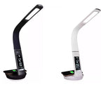 Black and white LED desk lamps with curved bodies, digital clocks, and wireless charging bases side by side.