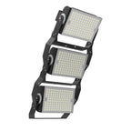 Three-module LED flood light with adjustable brackets and control dials, shown at an angle against white background.