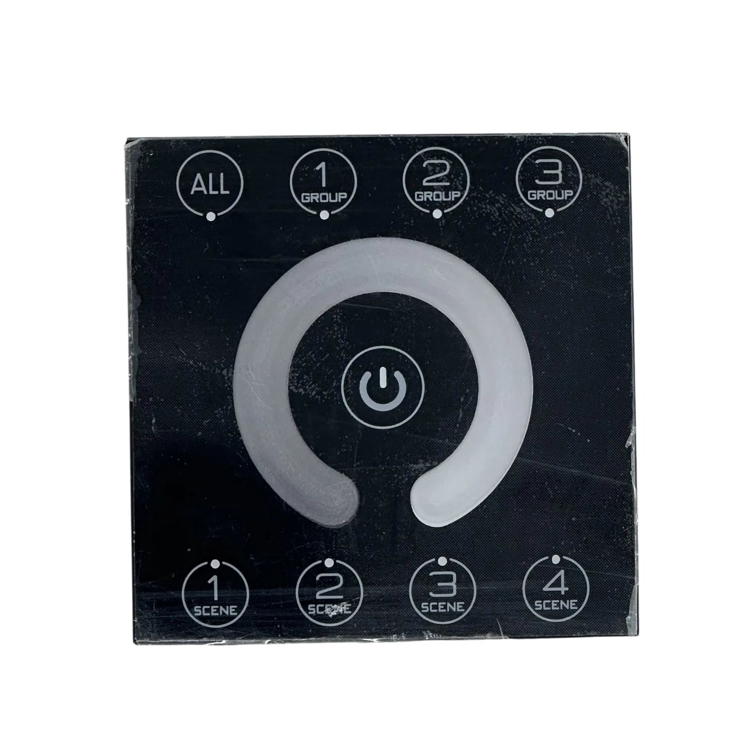 Black square DALI dimmer controller with gray ring-shaped power button, group selection buttons at top, and scene selection b