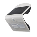 White solar LED wall light with motion sensor and four LED panels, mounted bracket visible.