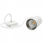 White cylindrical LED downlight with warm amber light source, shown with mounting plate and white cord against white backgrou