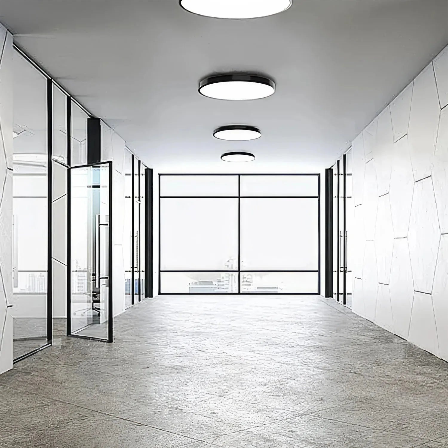 Modern office space with LunaRing surface mounted ceiling lights installed in linear array across white ceiling, illuminating