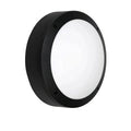 Black circular LED bulkhead light with white diffuser and mounting holes, viewed at an angle against white background.