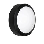 Black circular LED bulkhead light with white diffuser and mounting holes, viewed at an angle against white background.
