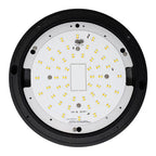 Interior view of round LED bulkhead fixture showing white circuit board with yellow LED chips arranged in circular pattern, b