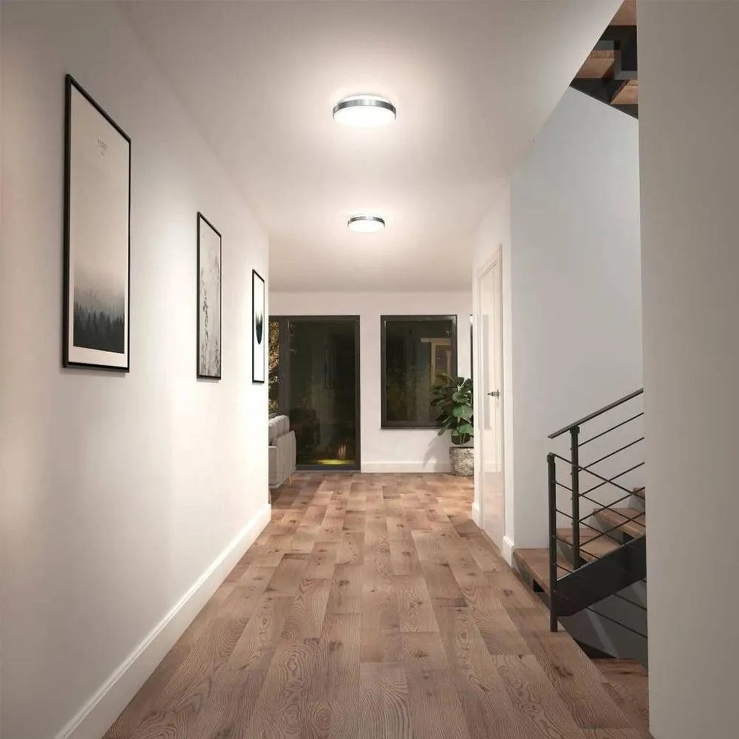 Artika Saturn flush mount LED ceiling light installed in modern hallway with white walls and wooden flooring