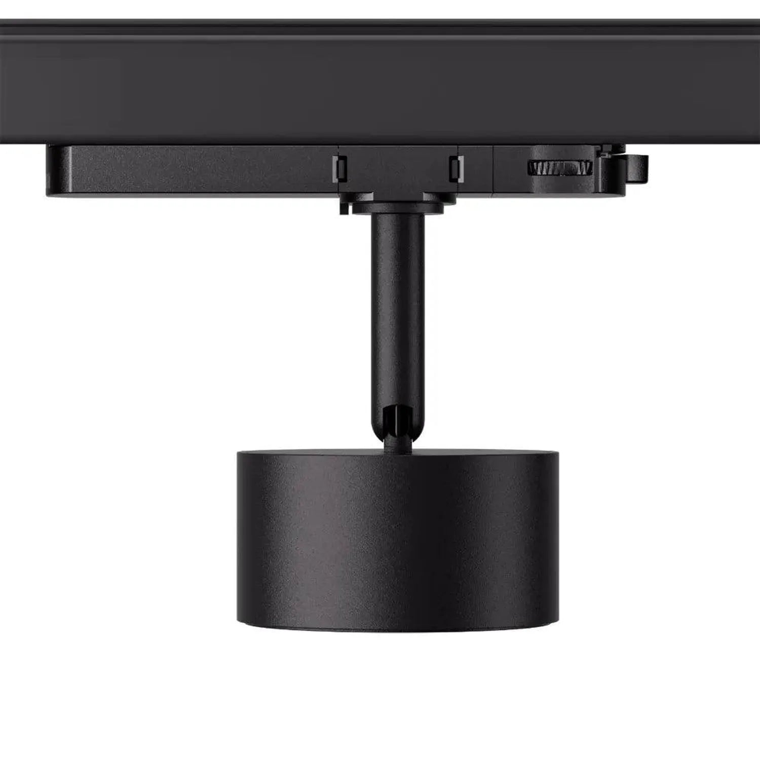 Black cylindrical LED track light mounted on metal rail system, showing fixture head and connection hardware.