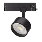 Black LED track light with spherical head and white reflector, mounted on rail adapter, product shot isolated on white backgr