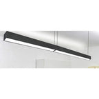 Black linear LED ceiling light fixture mounted horizontally against white ceiling and walls in installation shot.