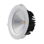 White LED recessed downlight with reflective dome, black heat sink, and amber LED center, shown as product alone against whit
