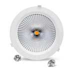 White recessed LED downlight fixture viewed from below, showing reflective interior cone with orange-lit center LED and mount
