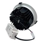 Disassembled LED downlight showing silver trim ring, black internal components with heat fins, and white driver unit with ele