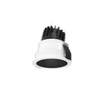 White recessed LED downlight with black internal heat sink and reflector, shown as product shot on white background.