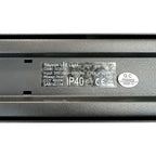 Close-up of product certification label showing Triumph LED Light specifications including 36W power, 4000K color temperature