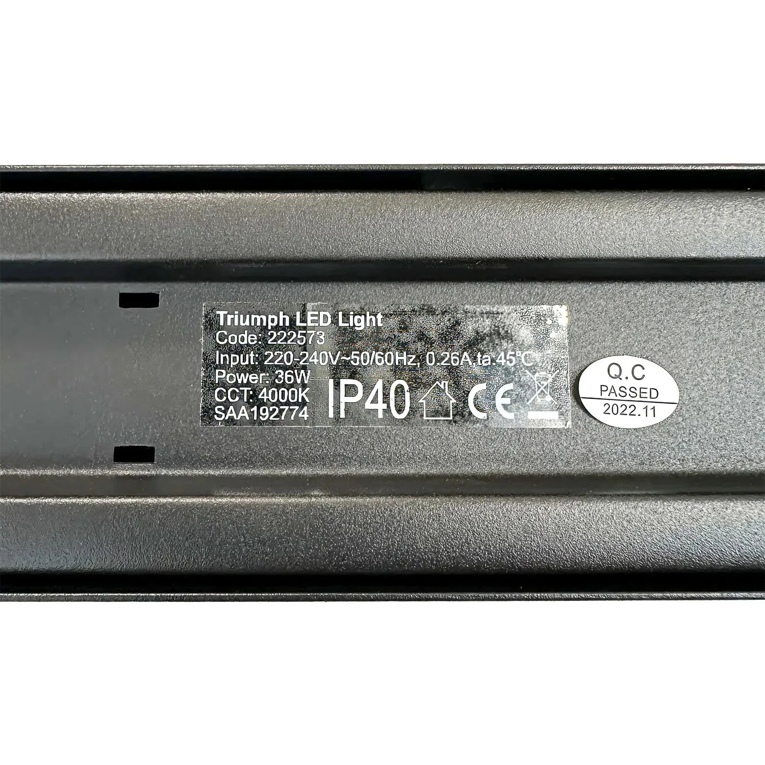 Close-up of product certification label showing Triumph LED Light specifications including 36W power, 4000K color temperature