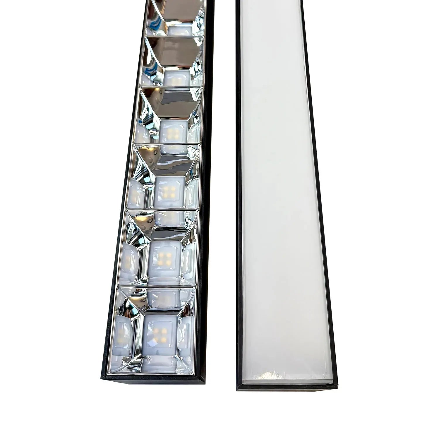 LED batten light with dual lens design showing internal LED modules and reflectors, displayed against white background.