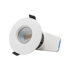 White recessed LED downlight with circular trim ring, reflective lens, and black mounting clips, shown at an angle against a 