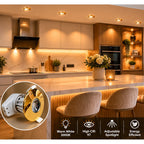 Gold LED downlight with adjustable spotlight in modern kitchen, showing warm white 3000K lighting with high CRI 97 and energy
