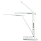 White LED desk lamp with adjustable arms and wireless charging base, shown against white background.