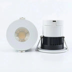 Front and side view of white recessed LED downlight with visible COB lens and separate white trim ring with black heat sink d