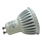 White LED GU10 spotlight bulb with ribbed heat sink and brass pin connectors, shown against white background.