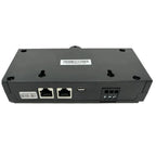 Black rectangular device with two ethernet ports, USB port, terminal block connector, and barcode labels on top and front.