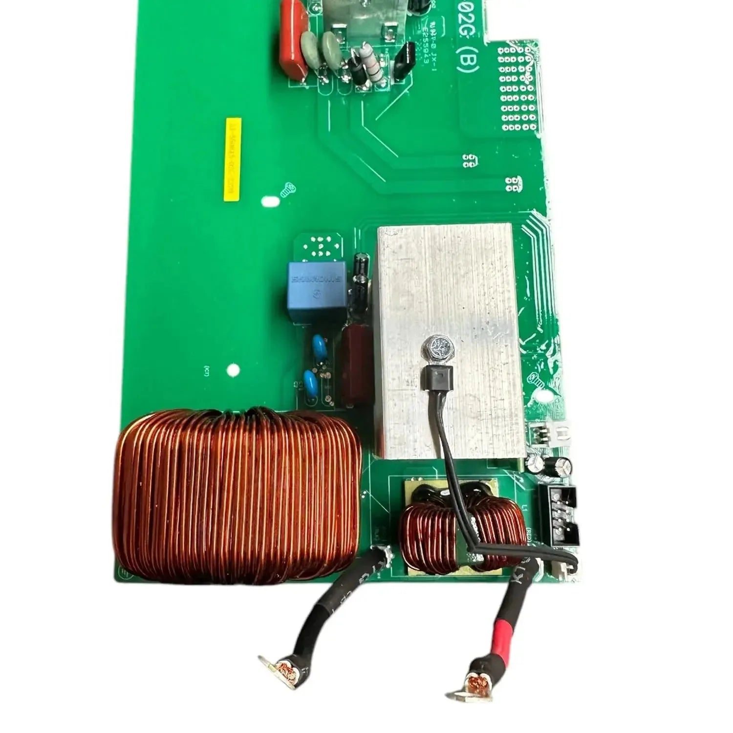 Green circuit board with copper coils, transformers, and electronic components for 5kW off-grid inverter power management.