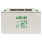 Hoppecke 12V deep cycle battery with cream-colored plastic casing, green branding, recycling symbols, and three compartment o