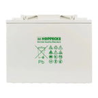 Hoppecke deep cycle battery packaging showing German quality standard logo, care instructions, and lead content warning label