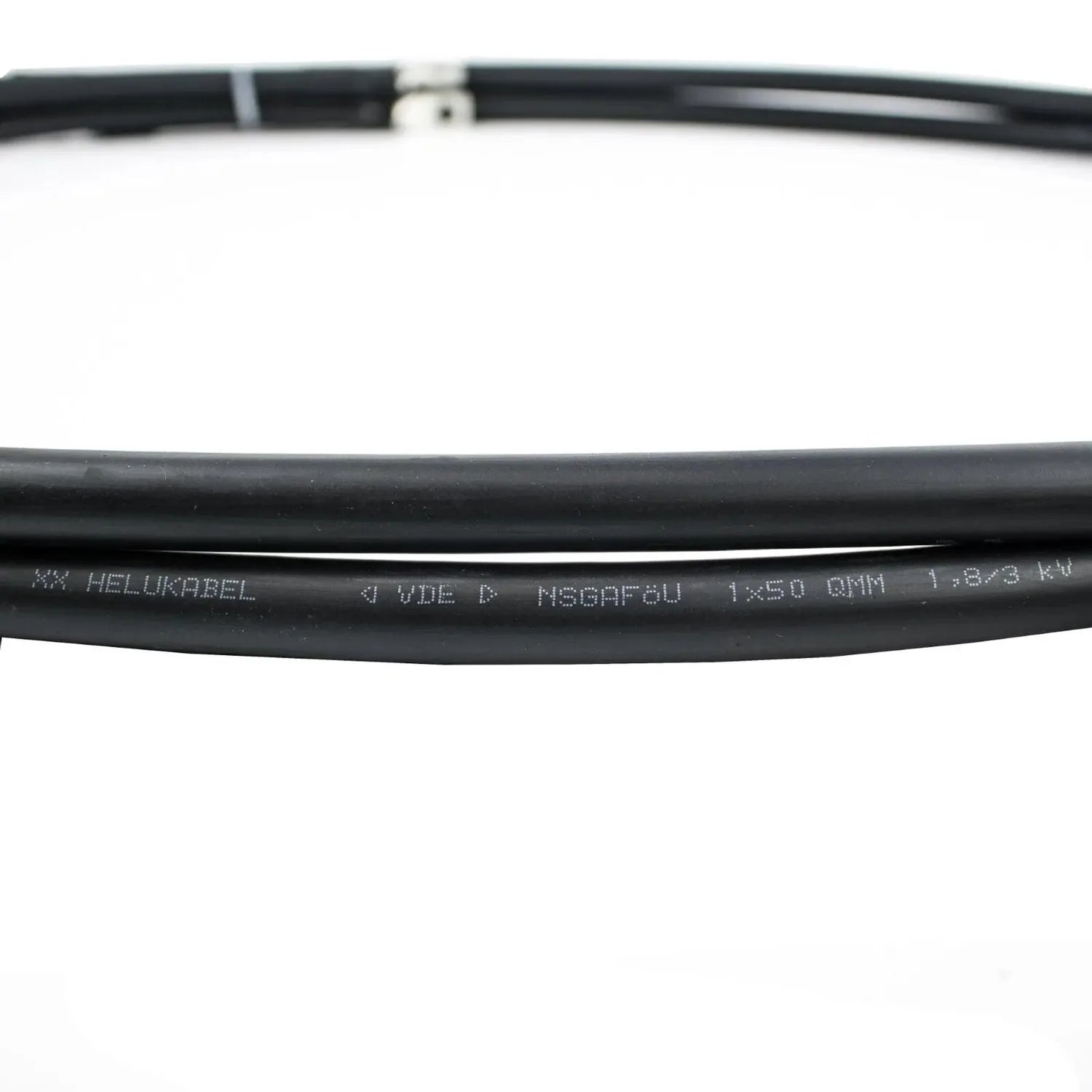 Black rubber hose labeled Helukabel with 1x50 QMM specifications and voltage rating, close-up detail shot.
