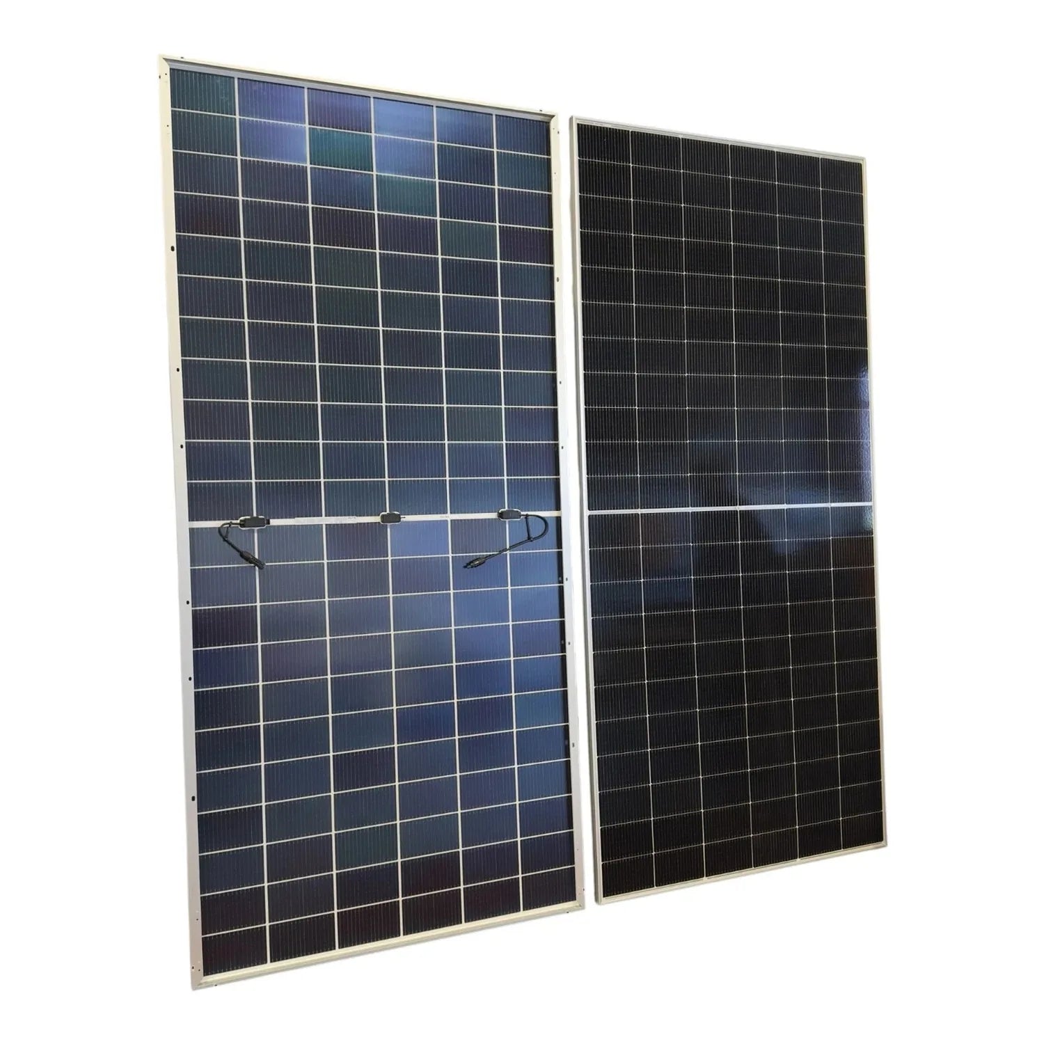 Two bifacial solar panels with white frames and gridded dark cells, mounted at an angle against a white background.