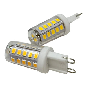 Two G9 LED light bulbs with white ceramic bases and yellow SMD chips arranged diagonally against white background.