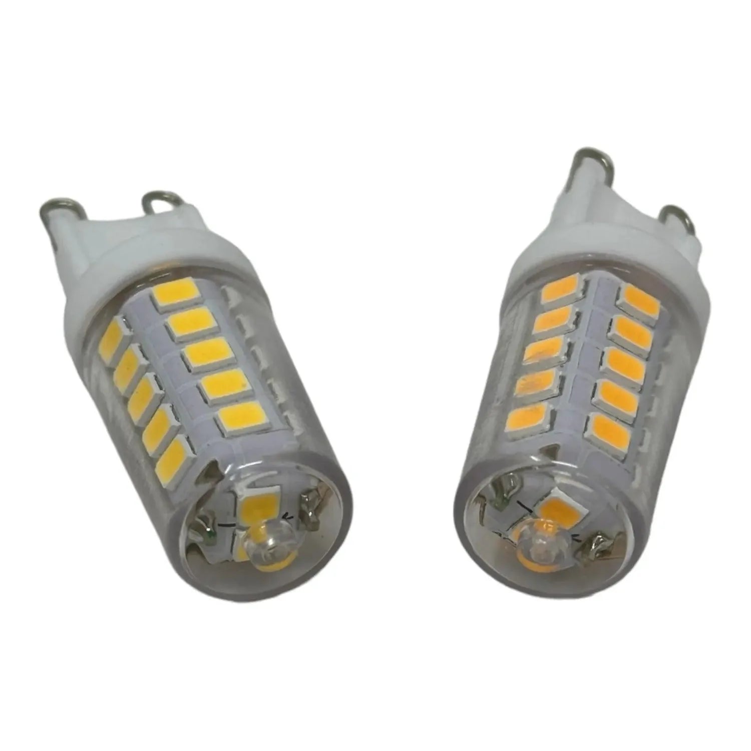 Two G9 LED light bulbs with ceramic bases and warm white SMD chips arranged side by side against white background.