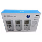 Uni-Com easy read electronic timer 3-pack product box showing three white plug-in timers with LCD displays.