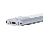 Silver LED under cabinet light showing USB-C charging port and control buttons on end cap